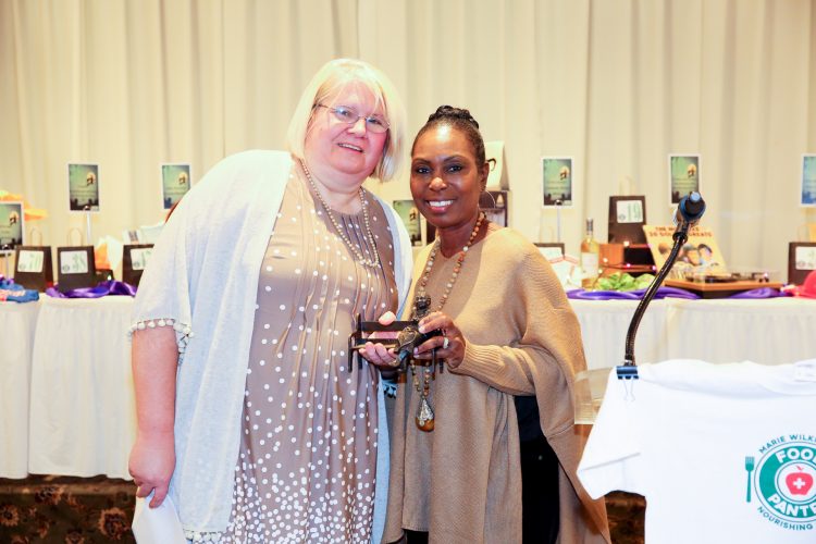 MWFP Board President presents Annette Johnson with award. 