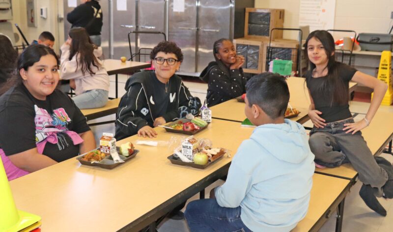 5th graders enjoy the "totchos" lunch special with friends.